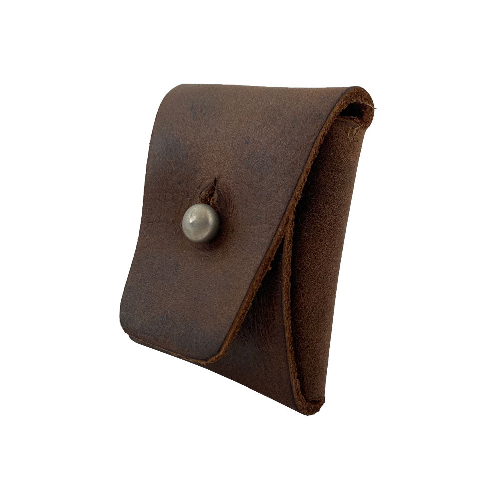 Side view of the Minimalist Square Coin Pouch by Hide & Drink, illustrating its compact design and snap closure. This handcrafted pouch is made from full grain leather, adding a touch of elegance to your everyday essentials. Minimalist Coin Pouch, SD Card Holder, Wallet and Cash Organizer, Full Grain Leather, StockyardX, Small Batch Production, Hand Cut, Hand Sewn, Fire Branded, Artisan, Handmade in La Antigua Guatemala & Oaxaca Mexico.