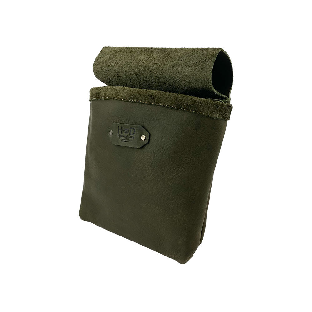 Side view of the Constructor Belt Bag in olive green by Hide & Drink, a must-have for constructors. This sturdy tool belt bag includes a single pocket made from premium full grain leather and is handmade in La Antigua Guatemala & Oaxaca Mexico.