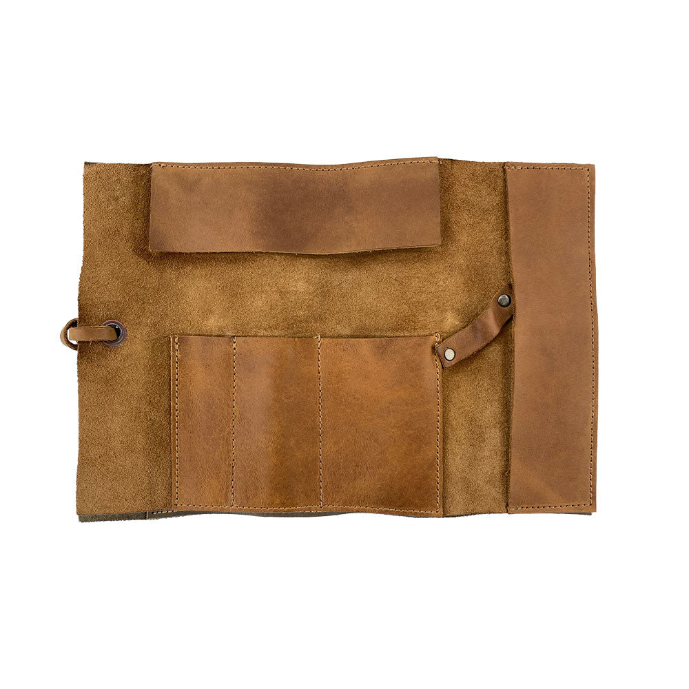 Interior layout of Hide & Drink Multi Purpose Pencil Roll showcasing various compartments. This handmade pencil roll pouch is designed to keep your tools organized while demonstrating rustic charm through artisan craftsmanship.