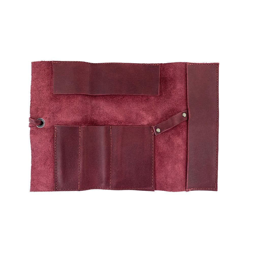 Hide & Drink Multi Purpose Pencil Roll displayed showing its skillful stitching and handcrafted quality. Ideal for organizing scissors, earphones, and other essentials, this rustic pouch embodies artisan craftsmanship.