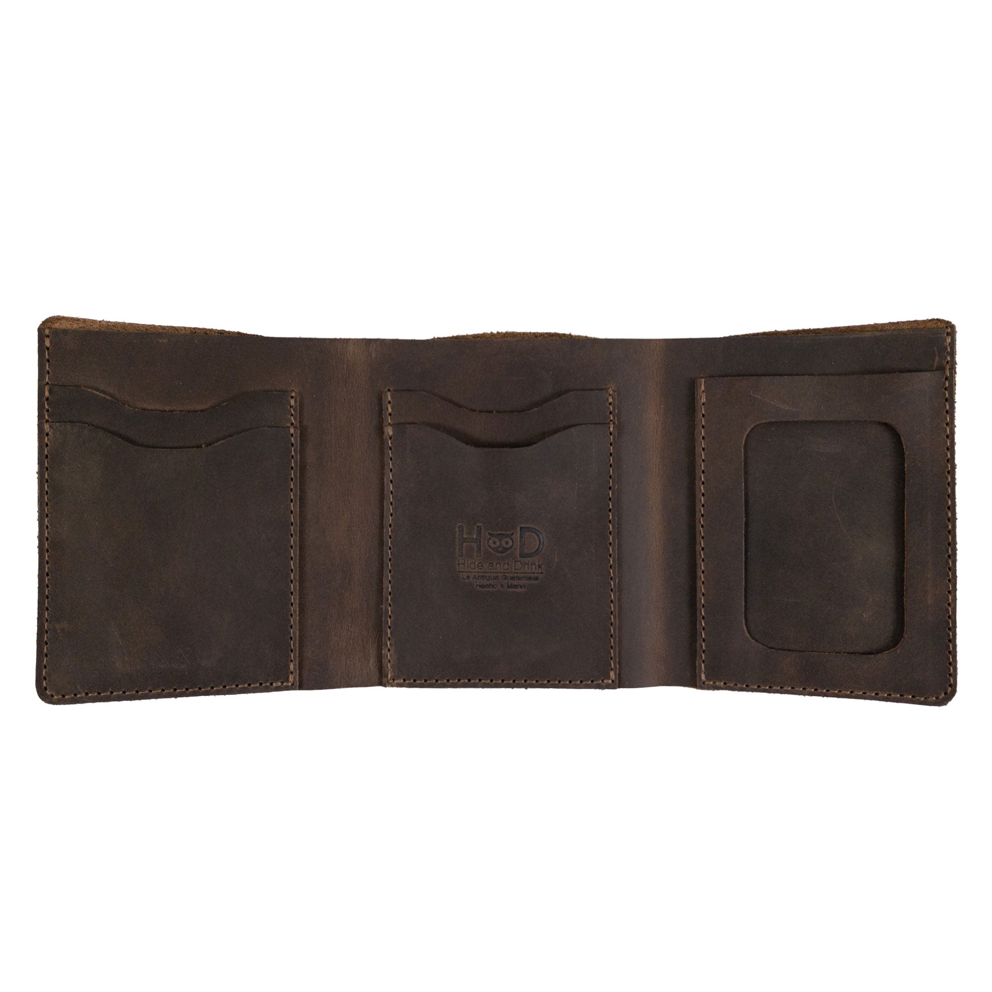 Open view of the Classic Trifold Wallet by Hide & Drink, showcasing multiple card slots and a smooth design made from Full Grain Leather. Ideal for those who appreciate Small Batch Production and Artisan handmade goods from La Antigua Guatemala & Oaxaca, Mexico.