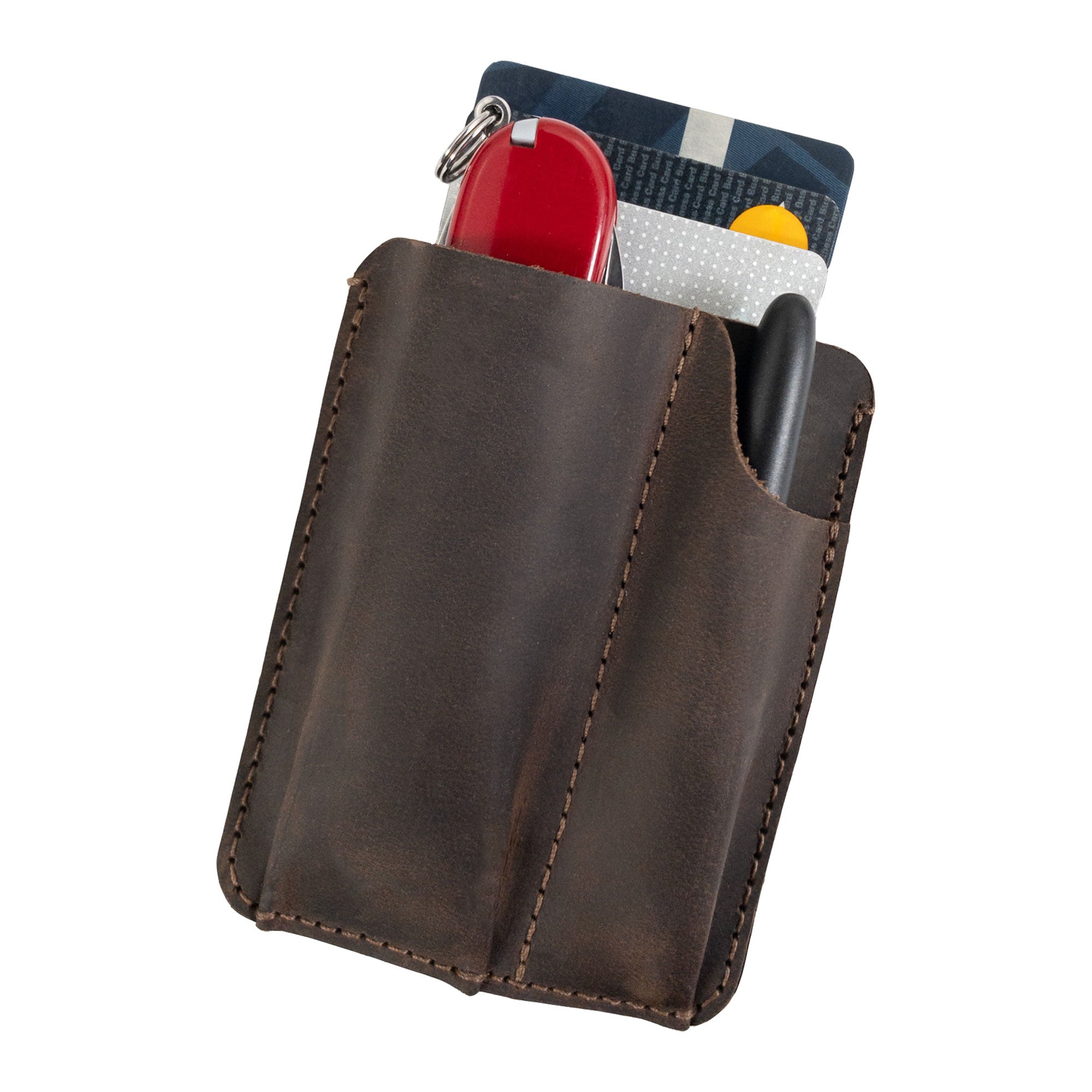 Valhalla Gear Tactical Card Holder with Pen Slots in use, holding a card and pen. This durable EDC Card Holder with Pen Slots, made of Full Grain Leather, represents artisan quality, hand cut, and hand sewn in La Antigua Guatemala.