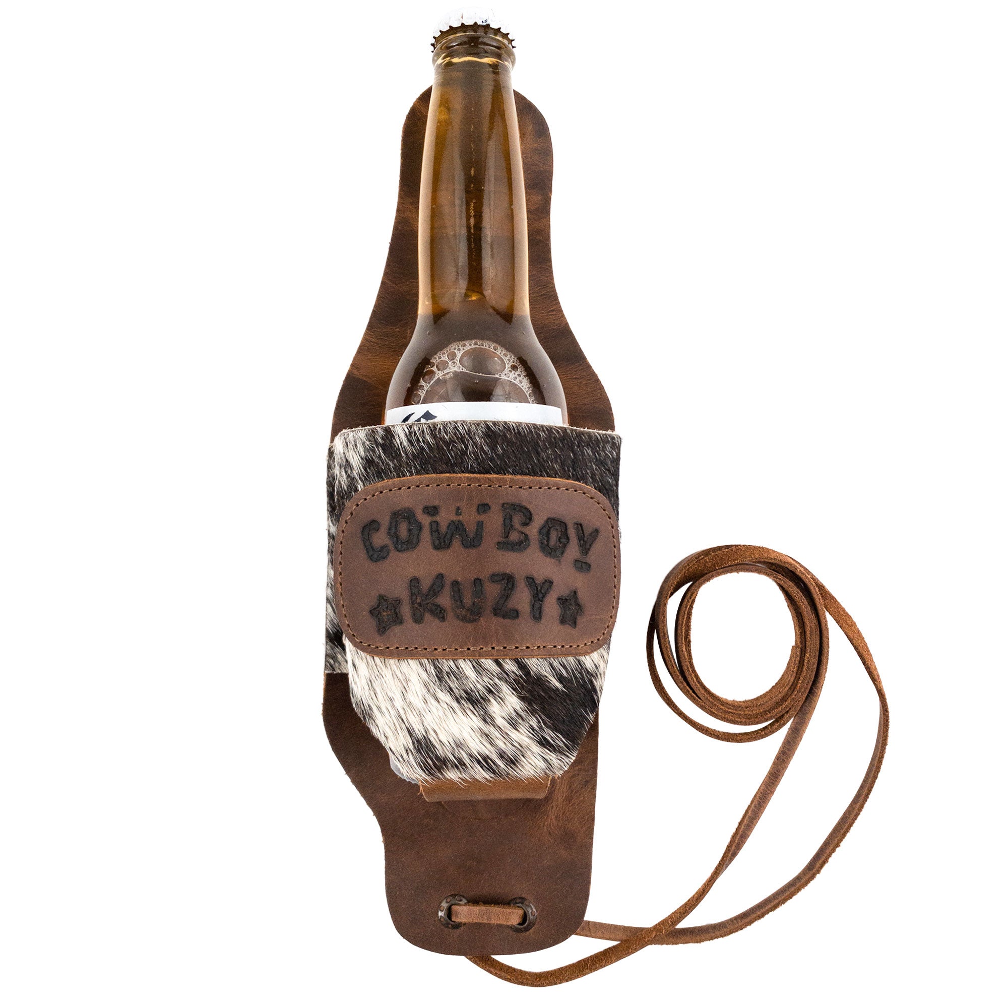 The Cowboy Beer Holster from Western Leather Works holding a bottle, emphasizing its functionality as a handsfree beverage holder. This product is perfect for parties and features stunning artisan craftsmanship with a fire branded finish. Made from full grain leather in La Antigua Guatemala & Oaxaca Mexico.
