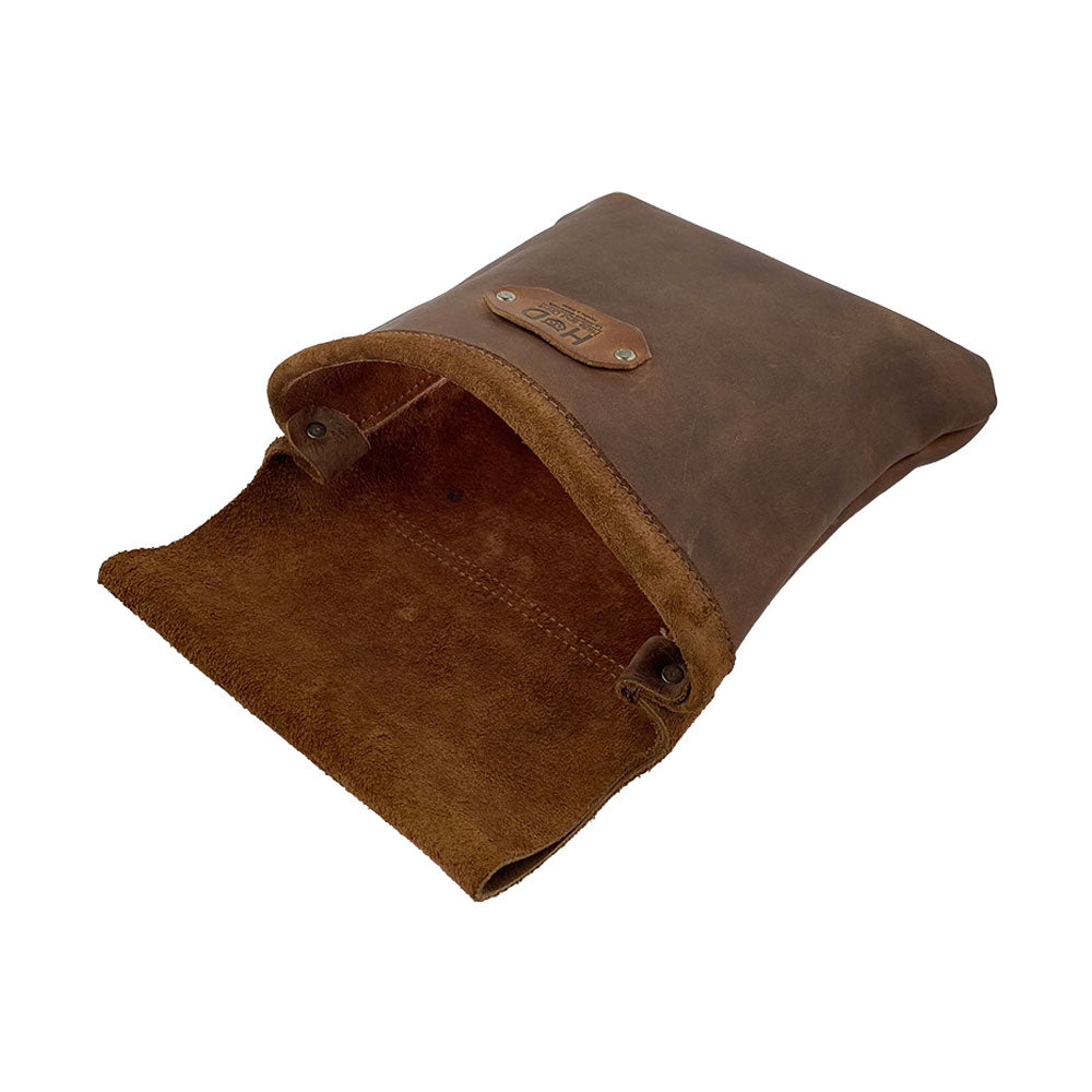 Open view of the Constructor Belt Bag by Hide & Drink, a high-quality tool belt bag designed for constructors. It includes a large main pocket made from full grain leather, artisan-crafted in La Antigua Guatemala & Oaxaca Mexico. Perfect for easy access to tools.