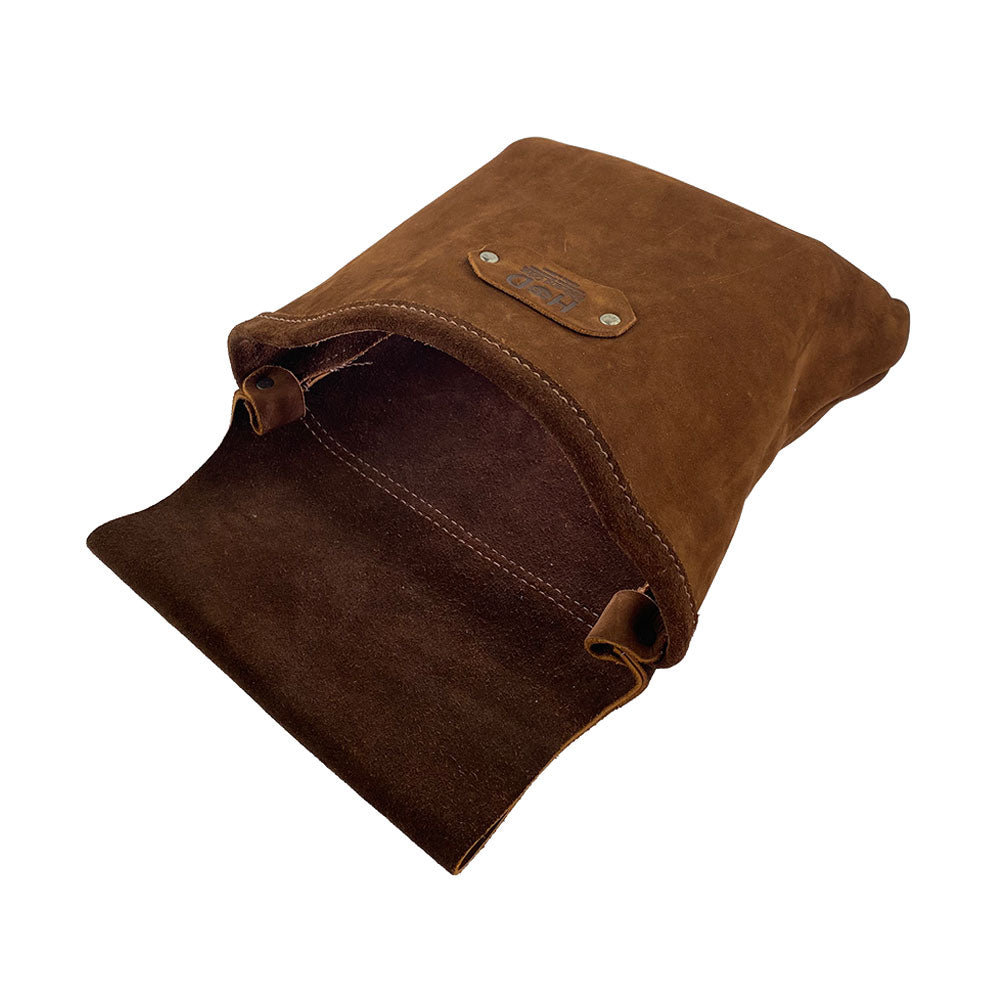Open view of the Constructor Belt Bag in bourbon brown by Hide & Drink, designed for constructors. This durable tool belt bag features a spacious main pocket, crafted from full grain leather in La Antigua Guatemala & Oaxaca Mexico.