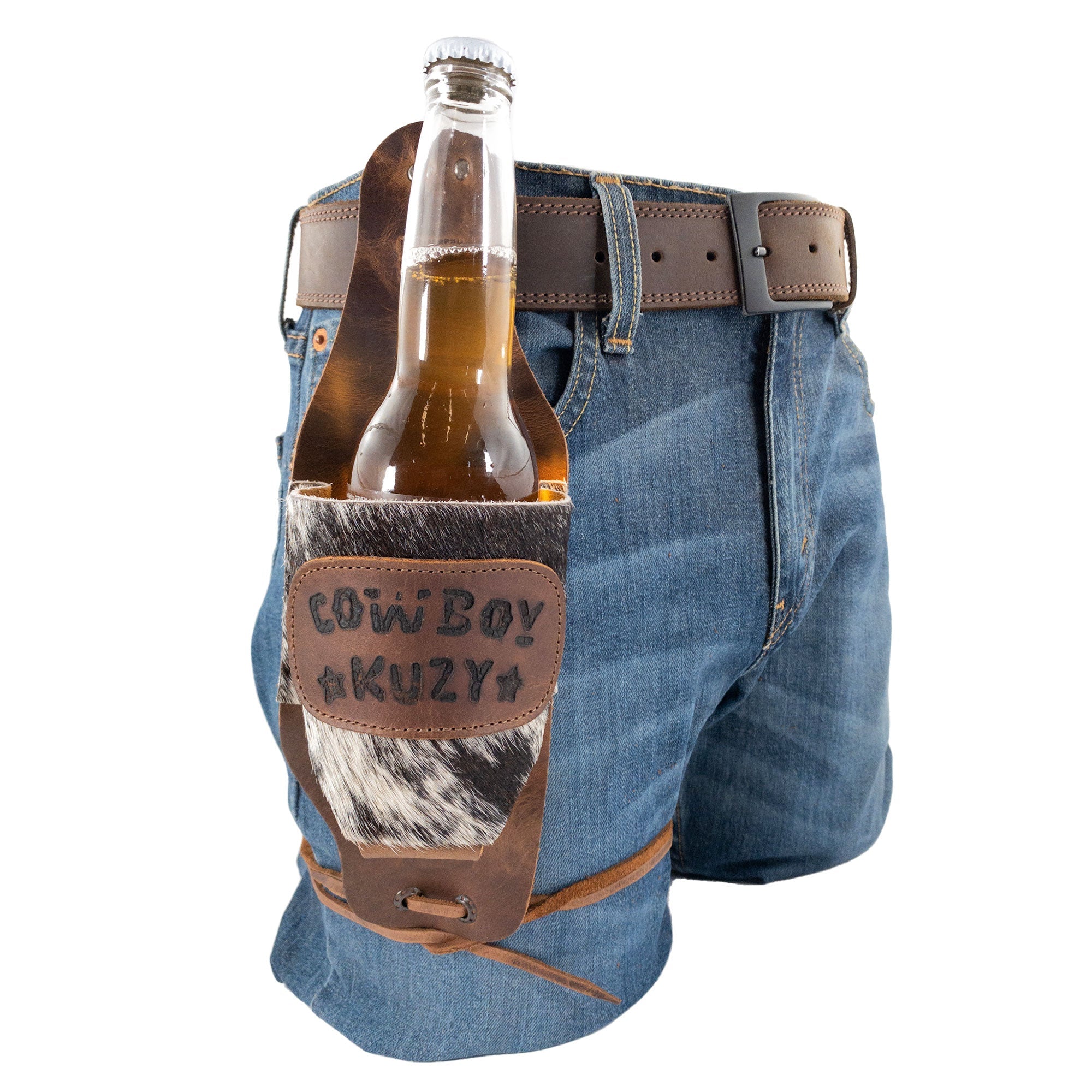 The Cowboy Beer Holster from Western Leather Works attached to denim shorts, showcasing its practical design for handsfree beverage holding at parties. Crafted from full grain leather, this men's gift gear represents quality artisan craftsmanship made in La Antigua Guatemala & Oaxaca Mexico.