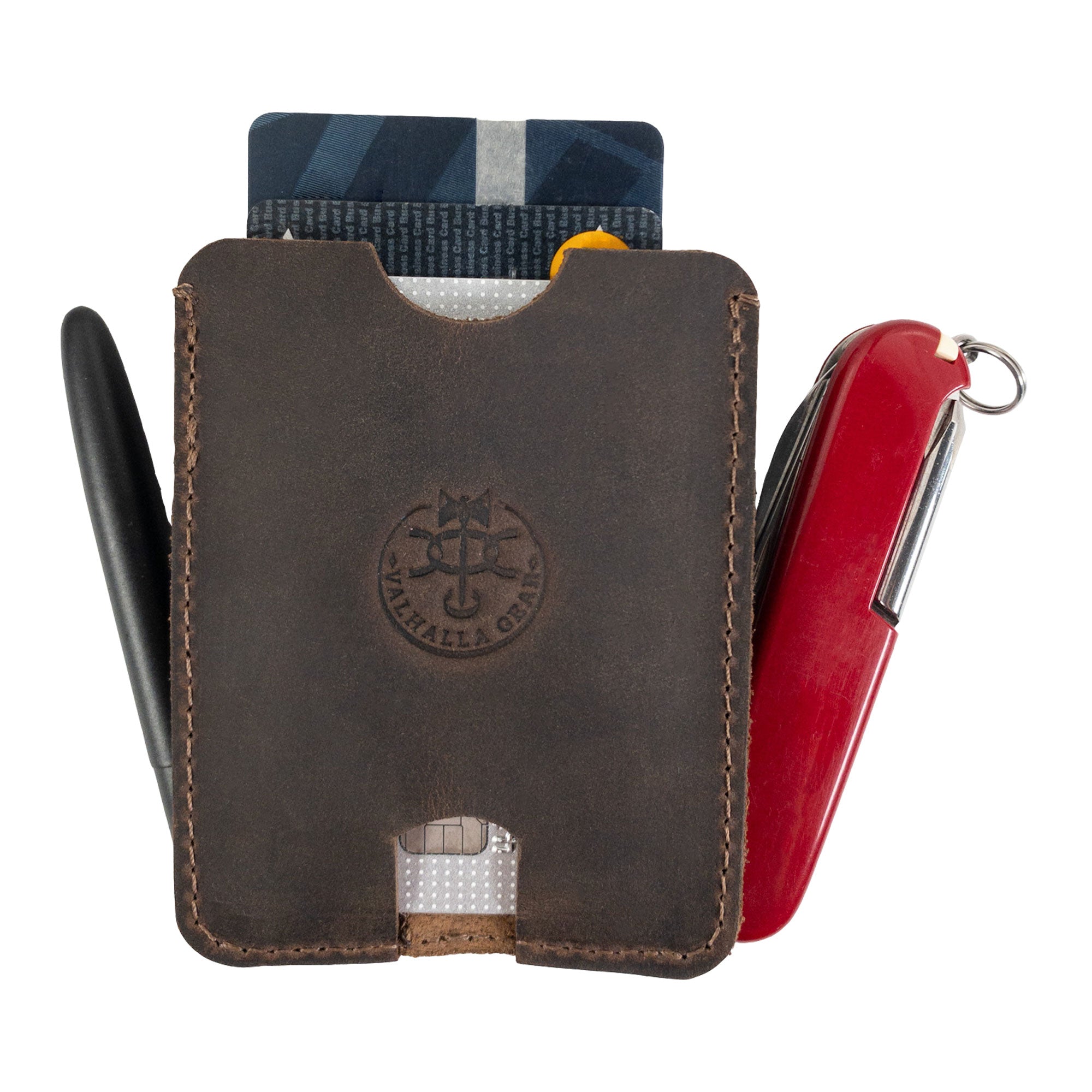 Side view of the Valhalla Gear Tactical Card Holder with Pen Slots displaying cards and a pen. Made from Full Grain Leather, this EDC Card Holder with Pen Slots reflects the perfect blend of Small Batch Production and artisan craftsmanship from La Antigua Guatemala.
