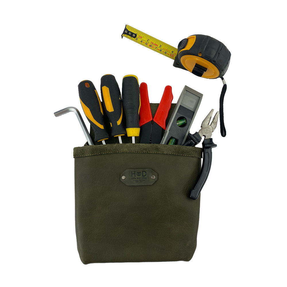 Constructor Belt Bag in olive green by Hide & Drink filled with tools, ideal for constructors. This tool bag features a single big pocket made from durable full grain leather, artisan-crafted in La Antigua Guatemala & Oaxaca Mexico.