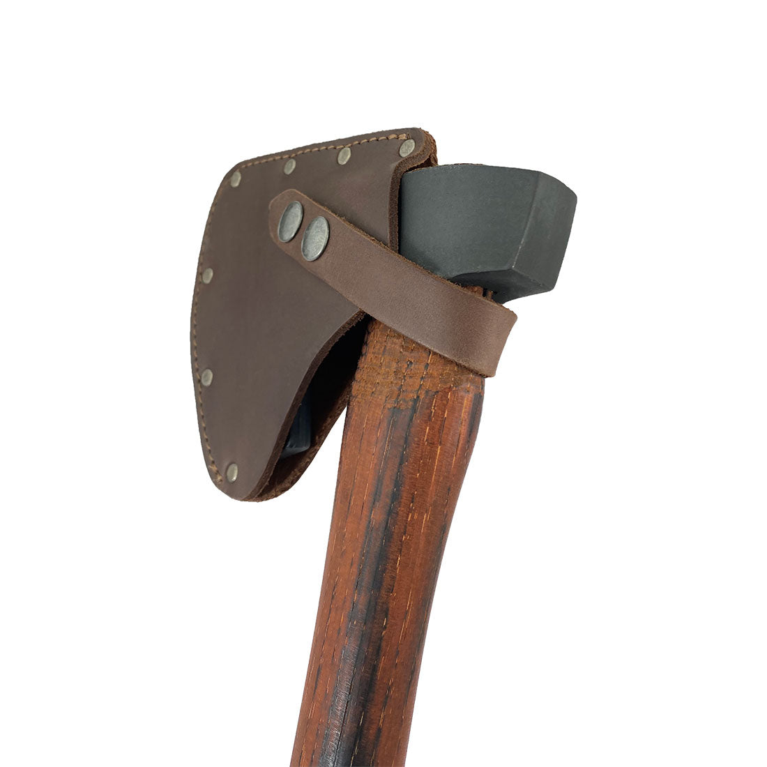 Camper Axe Head Sheath by Hide & Drink showcased secured on a pants belt, illustrating its portability as an Adjustable Axe Sheath. This durable protector case cover, made of Full Grain Leather, serves as a blade sleeve for camping accessories, underscoring artisan craftsmanship, small batch production, and handmade quality from La Antigua Guatemala & Oaxaca Mexico.
