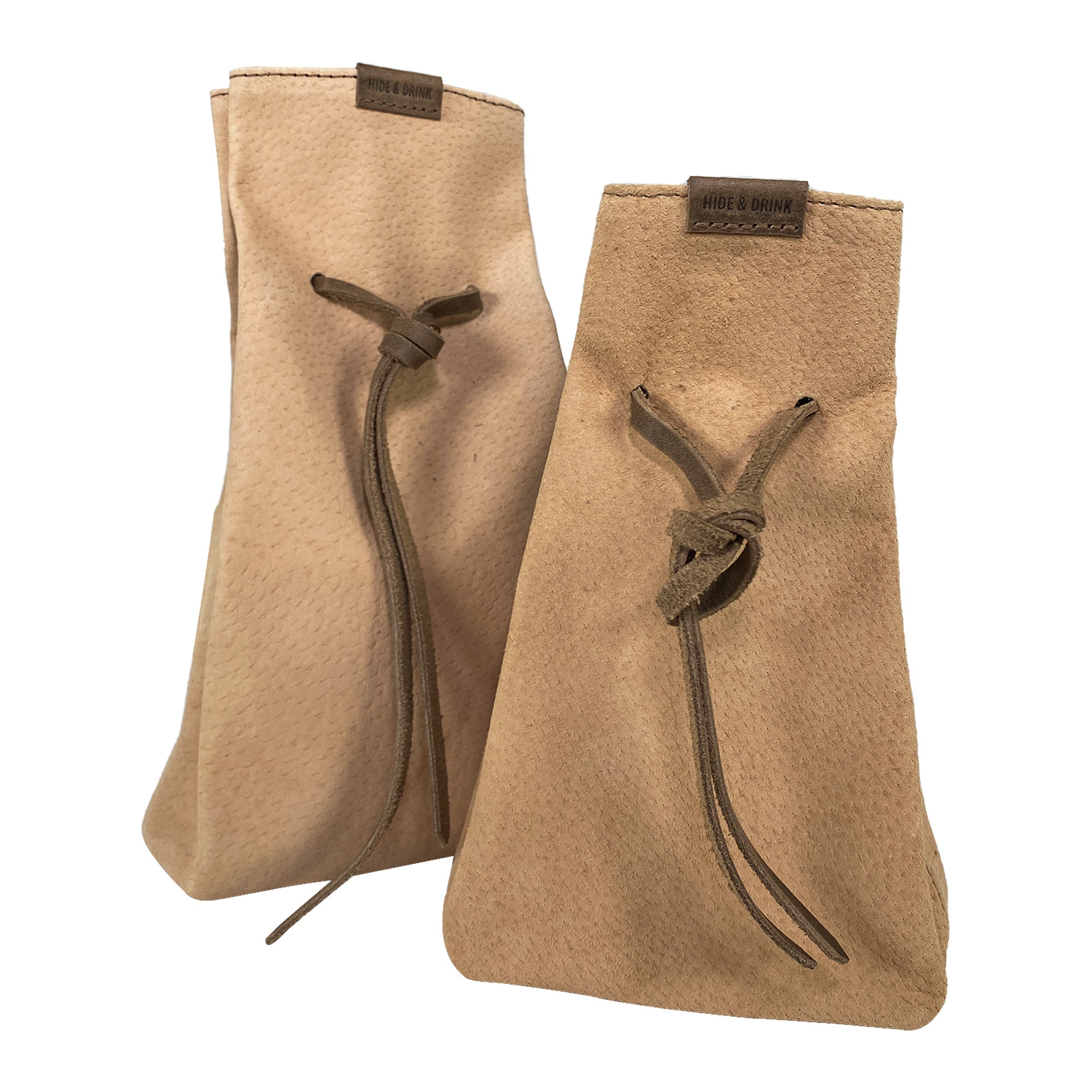 Hide & Drink's Drawstring Sack (2 pack) made from soft sheepskin leather, showcasing artisan craftsmanship. Perfect for organizing items. Drawstring Sack (2 pack) Handmade from Sheepskin and Full Grain Leather, StockyardX, Small Batch Production, Hand Cut, Hand Sewn, Fire Branded, Artisan, Handmade in La Antigua Guatemala & Oaxaca Mexico.