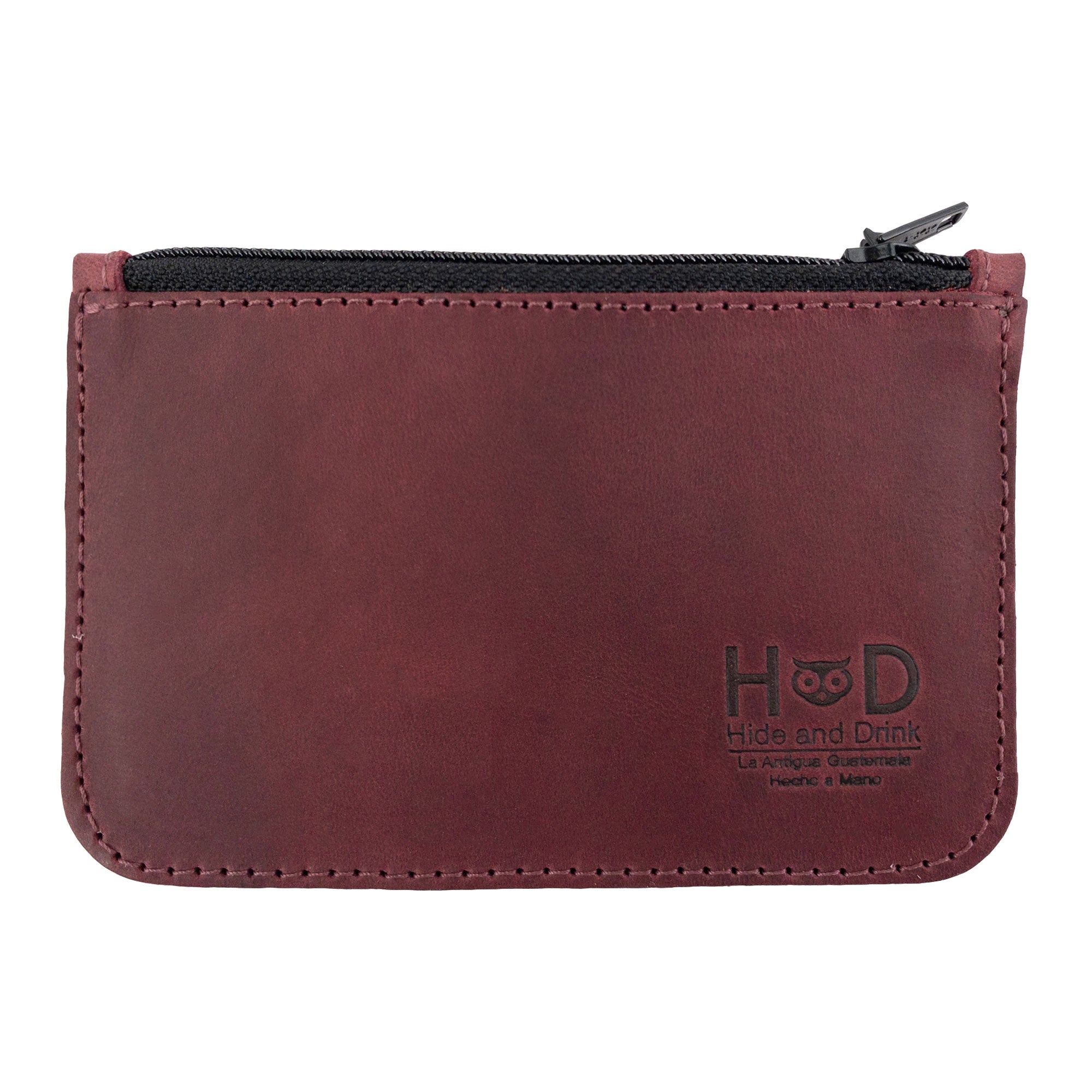 The back view of the exquisite burgundy Hide & Drink Zippered Wallet, illustrating its handcrafted quality and functionality. This artisan wallet serves as a stylish Folded Bills Storage and Coin Organizer, made from full grain leather.
