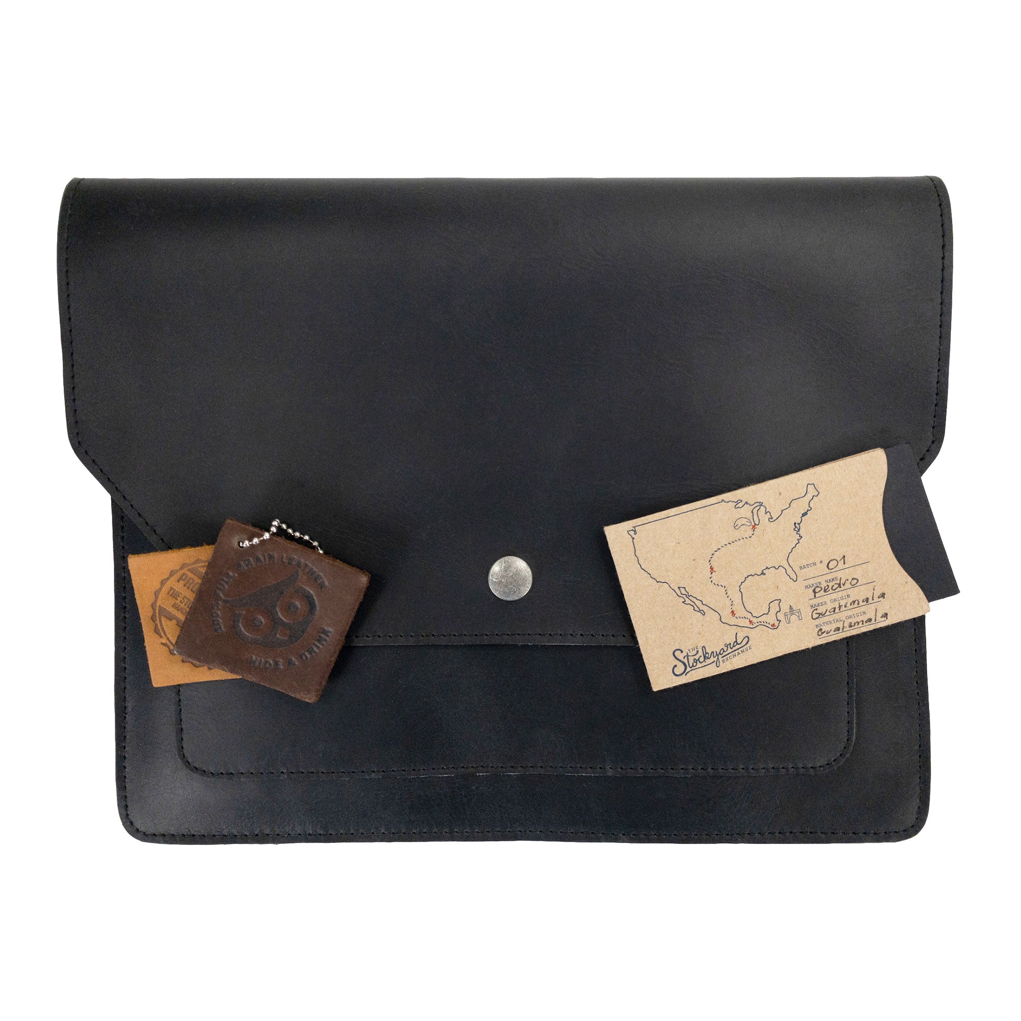 Hide & Drink's Slim Portfolio in brown, a stylish handmade Flat Messenger Case made from Full Grain Leather. This Narrow Document Holder is perfect for office use, showcasing artisan craftsmanship from La Antigua Guatemala & Oaxaca Mexico.