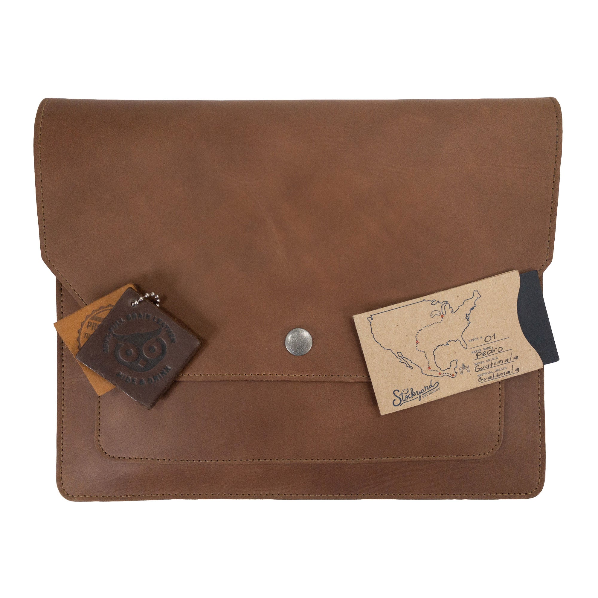 Back view of Hide & Drink's Slim Portfolio in blue, showcasing its craftsmanship and design. This handmade Flat Messenger Case serves as a spacious Full Grain Leather Narrow Document Holder, made in La Antigua Guatemala & Oaxaca Mexico.