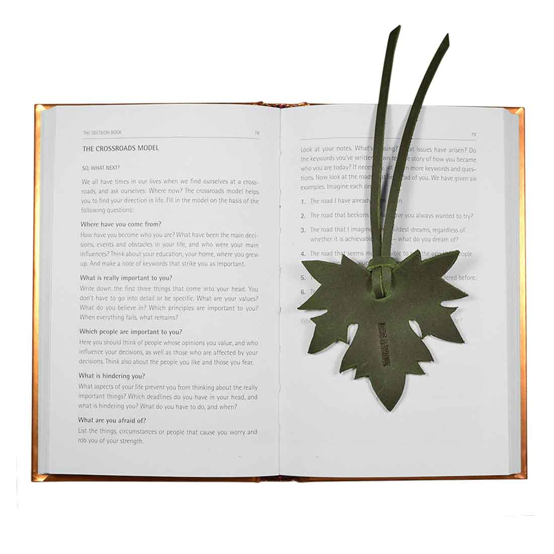 A stylish Autumn Bookmark (3 pack) by Hide & Drink, featuring a maple leaf design, perfect for book lovers. This cute accessory is made from Full Grain Leather, showcasing the artisan craftsmanship from La Antigua Guatemala & Oaxaca Mexico, ideal for bookworms and a thoughtful gift. Autumn Bookmark (3 Pack), Bookworm Gifts, Cute Accessories, Small Batch Production, Hand Cut, Hand Sewn, Fire Branded.