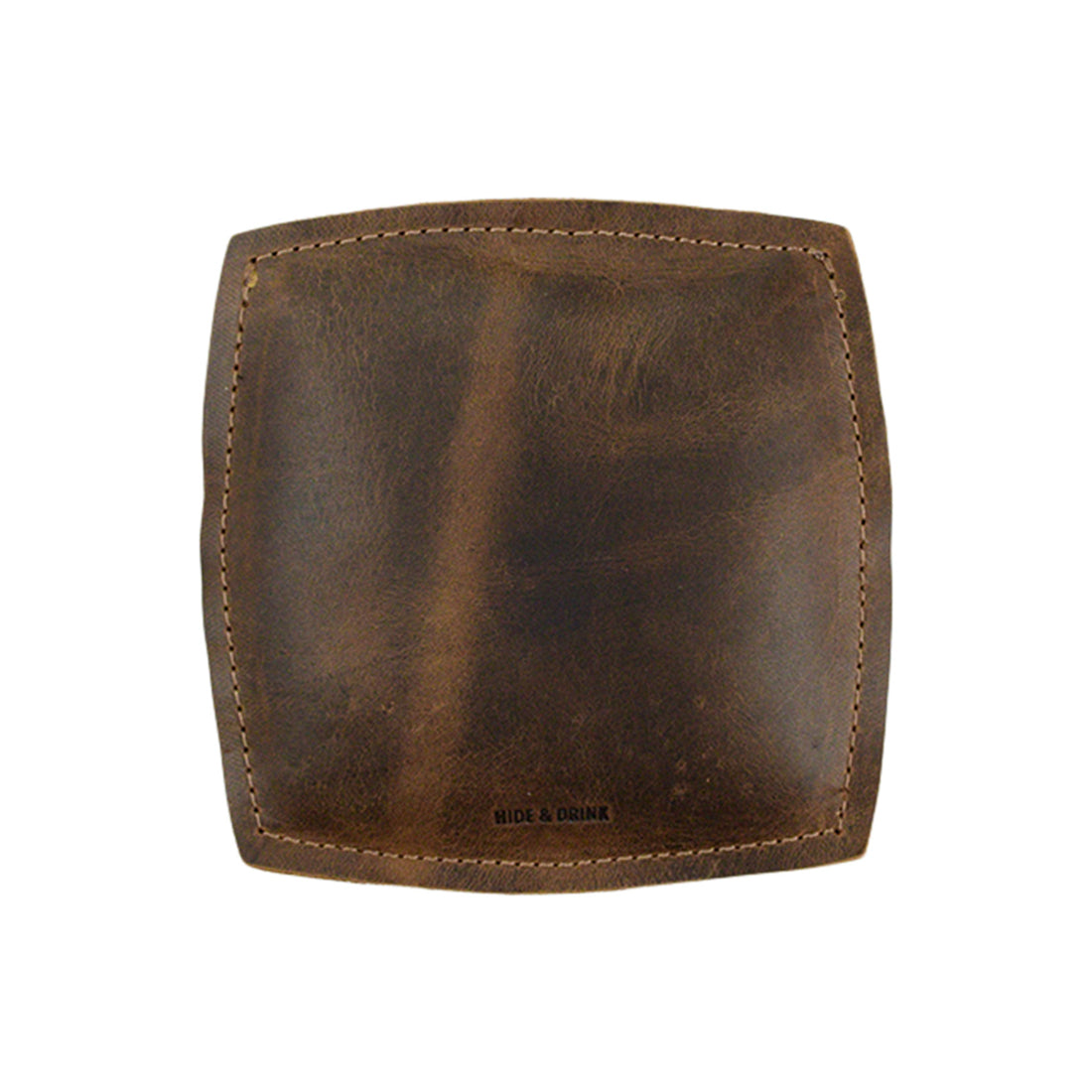 Top view of the Forearm Cushion by Hide & Drink, made from premium full grain leather. This elbow forearm cushion serves as a stylish wrist rest pad, essential for comfortable computing. Celebrating small batch production, it's hand cut and sewn, reflecting artisan craftsmanship from La Antigua Guatemala & Oaxaca Mexico.