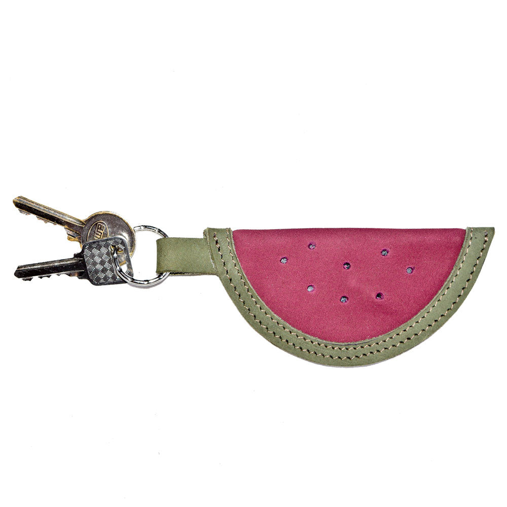 A charming Watermelon Keychain by Hide & Drink featuring a vibrant watermelon design. This cute key ring is handcrafted from high-quality full grain leather, representing small batch production. Perfect for fruit lovers, this key holder combines artisan craftsmanship with durability, embodying handmade quality from La Antigua Guatemala & Oaxaca, Mexico.