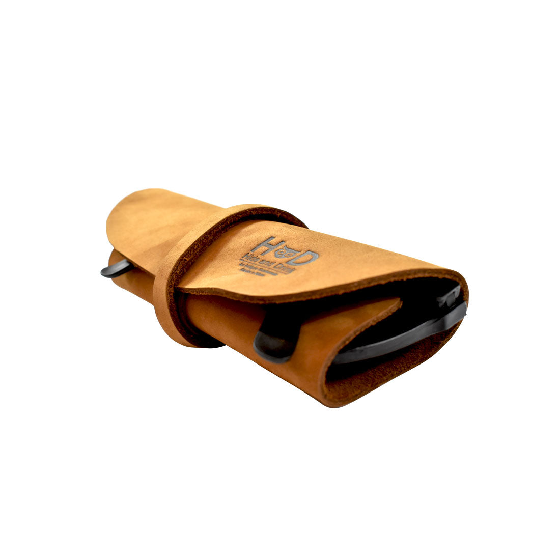 Hide & Drink Leather Sunglass Wrap offers a secure way to store sunglasses, made from high-quality full grain leather. This artisan-crafted eye glasses storage is great for travel and features hand cut and sewn construction in La Antigua Guatemala.