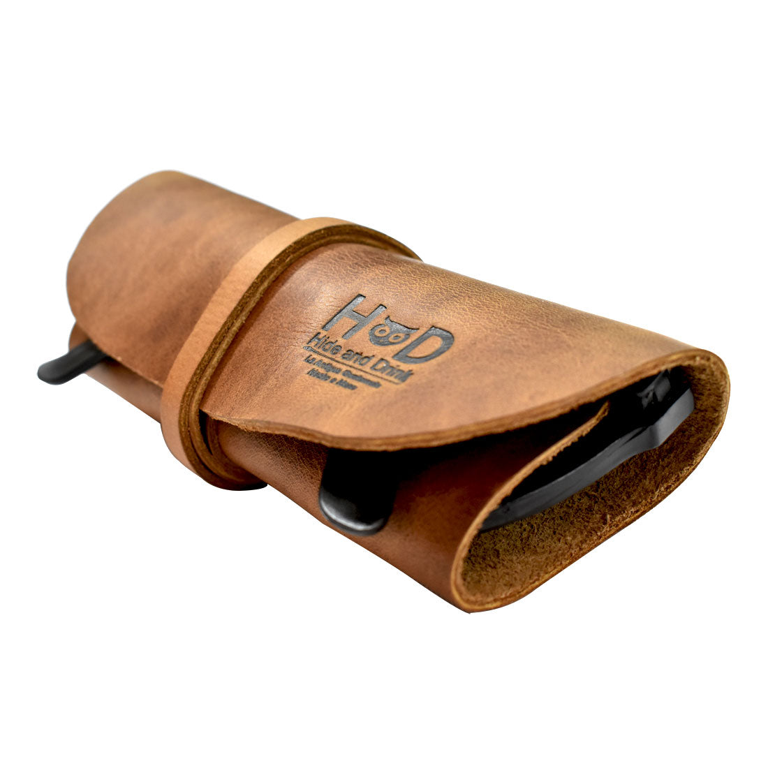 Hide & Drink Sunglass Wrap combines a classic design with modern functionality. Made from full grain leather, it offers a durable eye glasses storage solution for travel. Handcrafted in La Antigua Guatemala, it is fire branded and features small batch production.