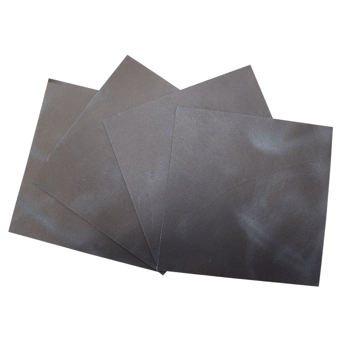 Hide & Drink Leather Squared Scraps 6 x 6 in. (4 Pack) featuring four full grain leather rectangles in a versatile 6x6 in. size, perfect for crafting or tooling. Ideal for hobby workshops, the small batch production of these hand cut, hand sewn, and fire branded artisan pieces comes from La Antigua Guatemala and Oaxaca Mexico.