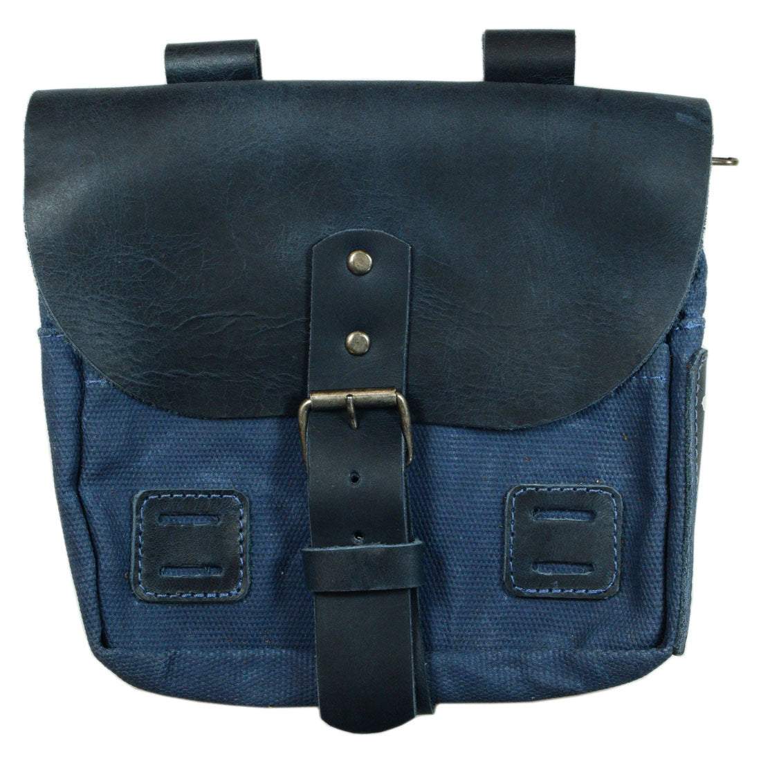 Open view of blue Survival Camping Pouch from Hide & Drink showing tool storage. Made from Water Resistant Waxed Canvas & Full Grain Leather, it’s great for outdoor essentials and handmade craftsmanship.