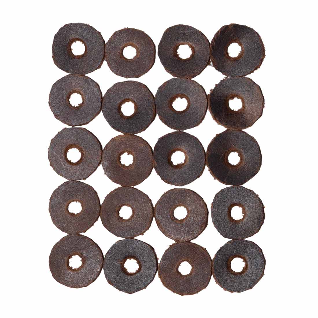 Leather Thin Washers (Set of 20) by Hide & Drink featuring a collection of hand-cut leather washers, perfect for mounting bicycle fenders and racks. These cushion washers have a 6/8 in. diameter and are made from full grain leather, showcasing artisan craftsmanship from La Antigua Guatemala. Ideal for those looking to protect new paint and furniture.