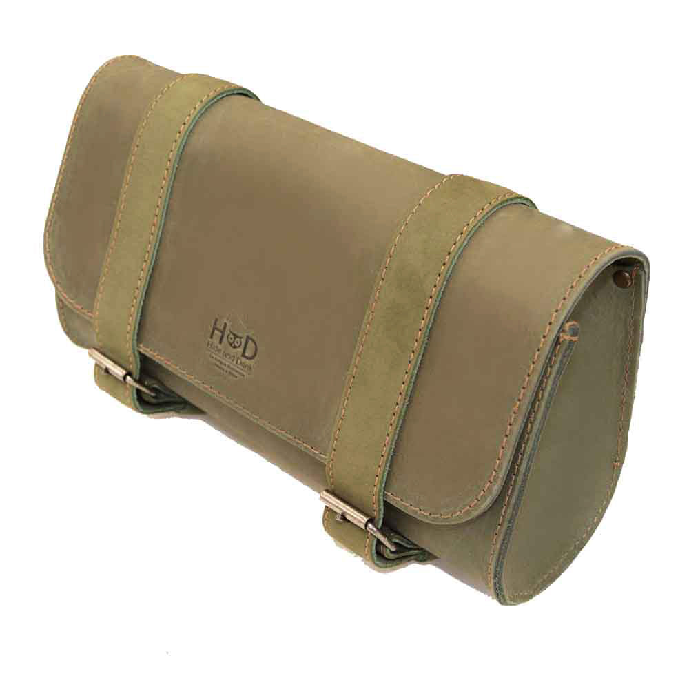 Hide & Drink Leather Motorcycle Tool Bag details displayed prominently, showcasing its Full Grain Leather construction ideal for bikers who need a stylish Biker Bag for Tools and Essentials. This practical Handlebar Bag with Adjustable Straps serves exceptionally as a Tool Organizer, handmade with care in La Antigua Guatemala & Oaxaca Mexico.