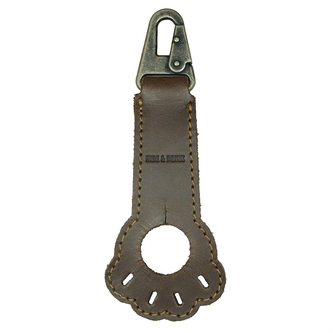 Paw Bottle Holder by Hide & Drink made from thick full grain leather, designed as a convenient dog lover accessory and belt holder, perfect for travel essentials. Each piece is hand cut, hand sewn, and fire branded, showcasing artisan craftsmanship in La Antigua Guatemala.
