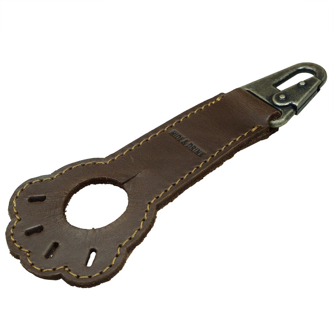 Thick full grain leather Paw Bottle Holder by Hide & Drink, ideal for dog lovers. A stylish belt holder and travel essential, crafted with care through small batch production and featuring artisan handmade details from Oaxaca Mexico.