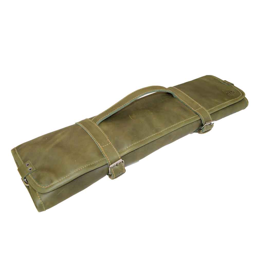 Side view of Hide & Drink Knife Roll With Water Resistant Lining (8 Pockets) in green. A versatile Chef's Knife Roll Bag (8 Pockets) that makes a perfect portable knife organizer and travel bag for chefs.