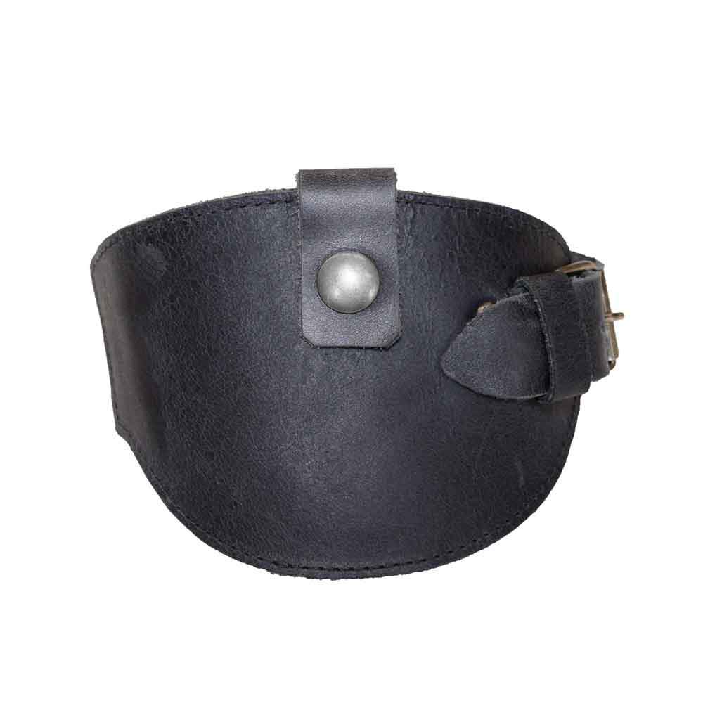 Front view of the black Motorcycle Boot Protector by Hide & Drink, featuring a buckle closure that ensures shoe safety from shifter damage. Handcrafted from high-quality full grain leather, this motorcycle accessory showcases artisan skill and is proudly made in La Antigua Guatemala.