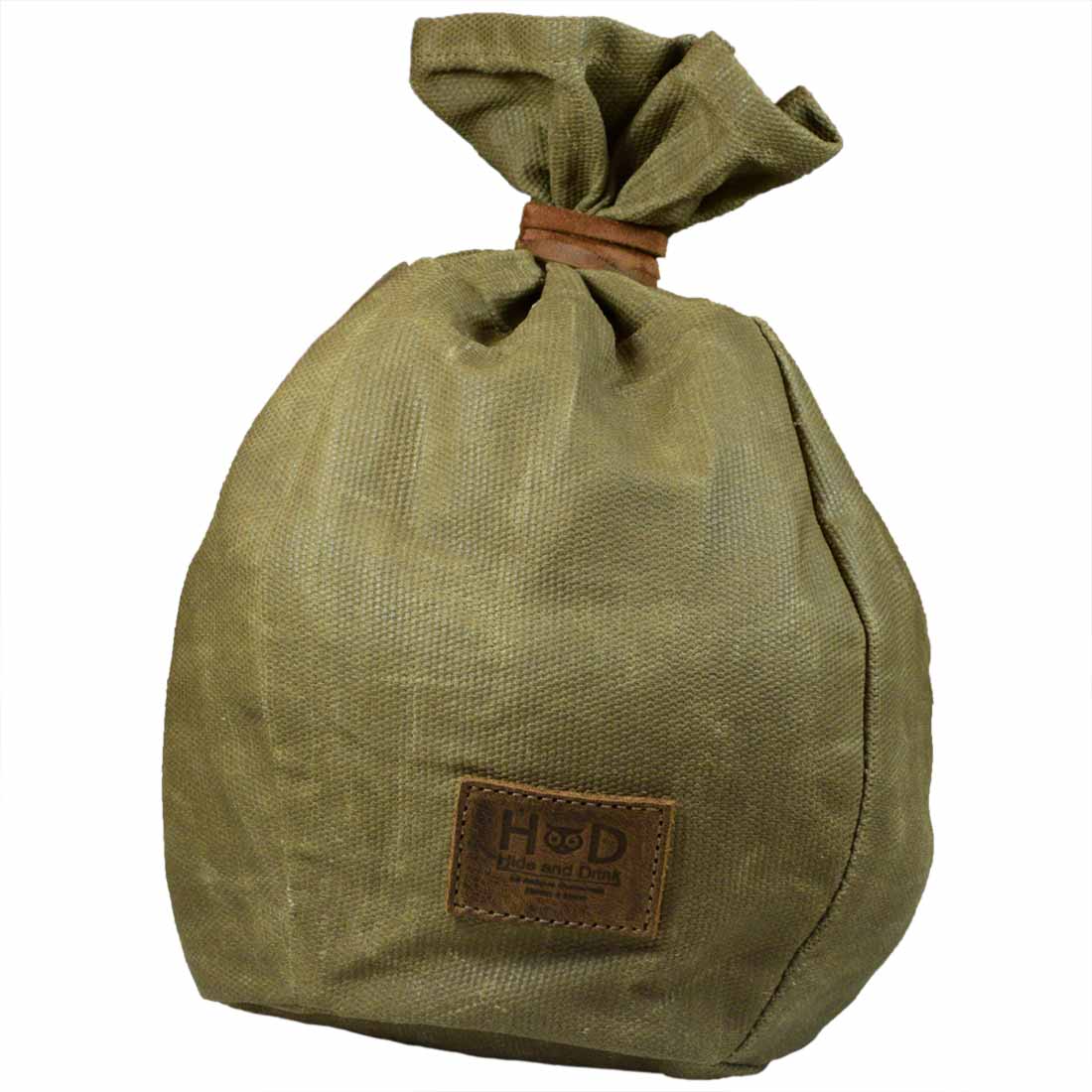 Bushcraft Tinder Bag by Hide & Drink, showcasing a rugged Waxed Canvas design. This water resistant outdoor pouch is perfect for camping accessories and features small batch production, hand cut, hand sewn craftsmanship. Artisan-made in La Antigua Guatemala & Oaxaca Mexico.
