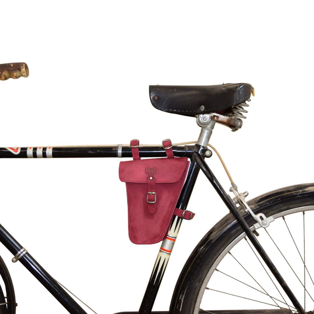 Bicycle with Hide & Drink's styled Triangular Frame Bag For Bicycle in red. This Full Grain Leather bag is designed to store bike tools and make your riding experiences easier, handmade in La Antigua Guatemala & Oaxaca Mexico.