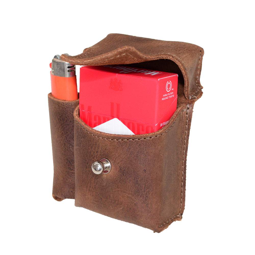 Hide & Drink Cigarette Pack & Lighter Cover displayed with a lighter and cigarette pack inside. This durable accessory is made from Full Grain Leather, featuring small batch production and artisan craftsmanship from La Antigua Guatemala & Oaxaca Mexico.