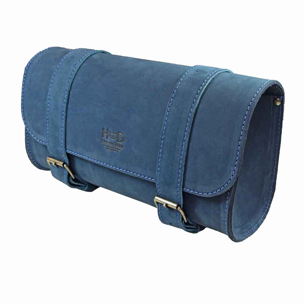 Hide & Drink Leather Motorcycle Tool Bag features a unique design, crafted from top-grade Full Grain Leather, perfect for motorcyclists in need of a stylish Biker Bag for Tools and Essentials. This versatile Handlebar Bag with Adjustable Straps will serve as an efficient Tool Organizer, handmade in La Antigua Guatemala & Oaxaca Mexico.