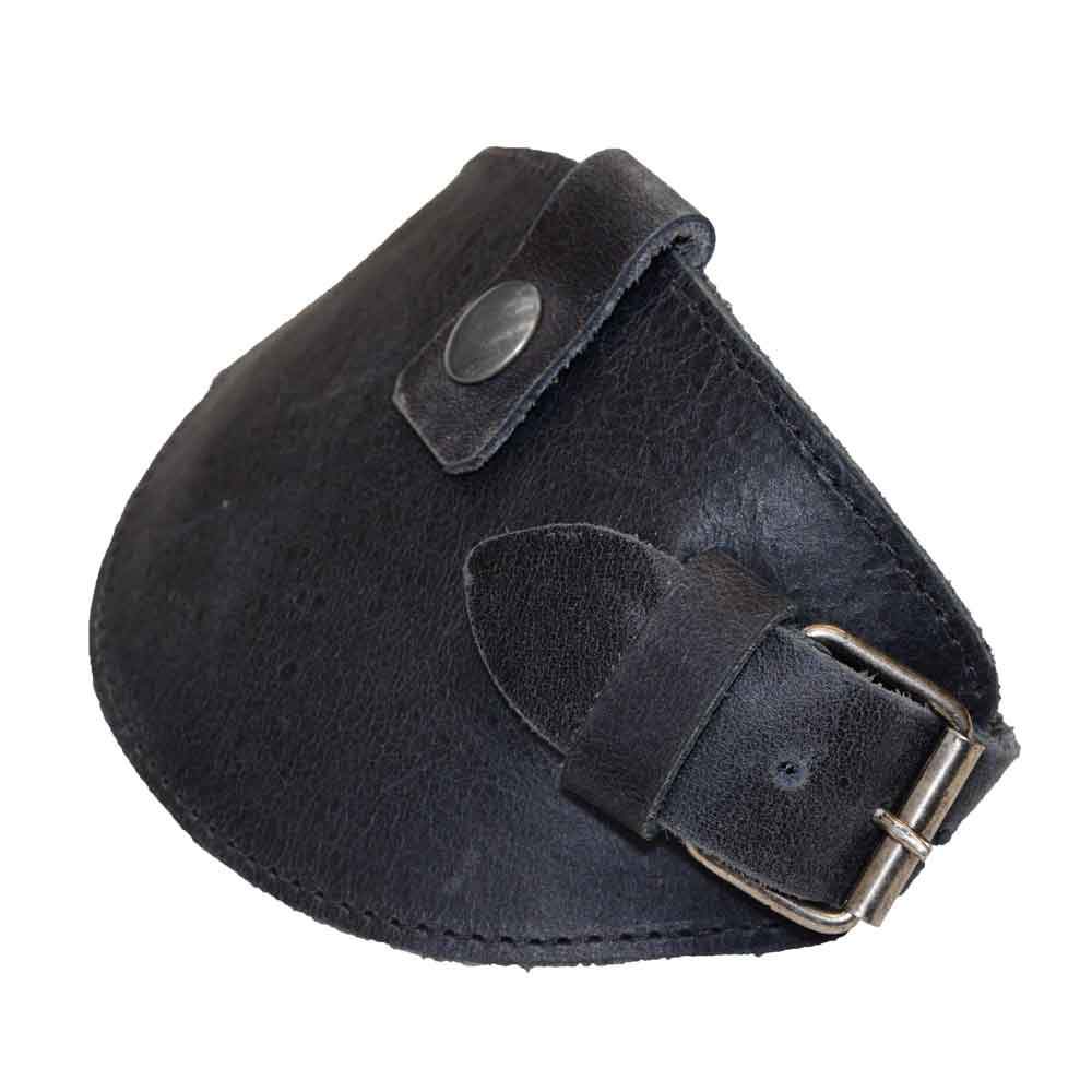Motorcycle Boot Protector in black by Hide & Drink, showcasing its durable buckle closure for effective shoe protection against the shifter. This biker gear is made from full grain leather, emphasizing the rustic guard design, hand-sewn by artisans in La Antigua Guatemala.