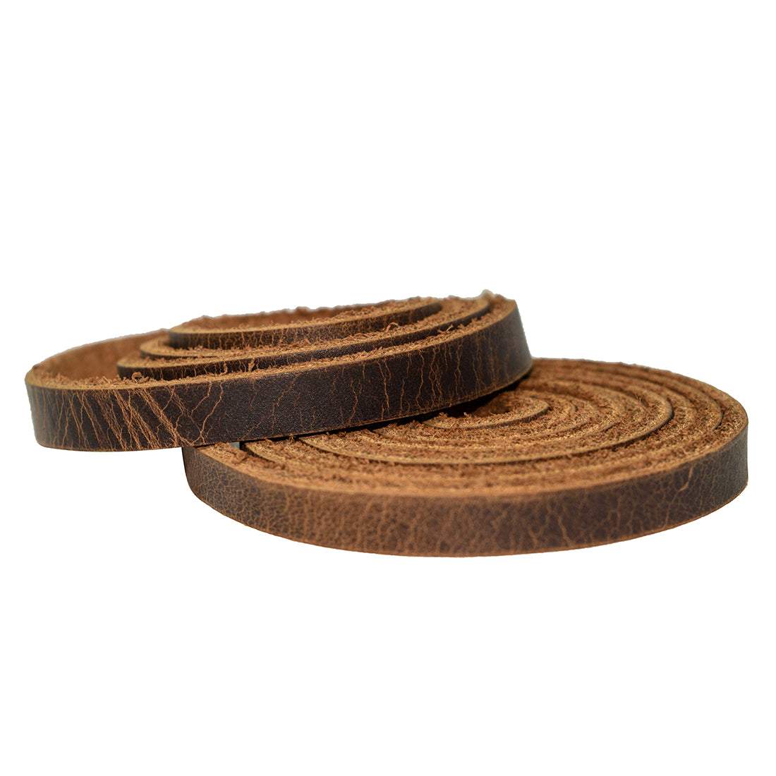Leather Strap 1/4" Wide, 1.8mm Thick by Hide & Drink, showcasing two rolled leather straps in a rich brown color, perfect for craft projects. Leather Strong Strap (0.25 in.) Wide, Cord Braiding String, Medium Weight (1.8mm Thick) (48 in.) Long for Crafts/Tooling/Workshop, Full Grain Leather, StockyardX, Small Batch Production, Hand Cut, Hand Sewn, Fire Branded, Artisan, Handmade in La Antigua Guatemala & Oaxaca Mexico.