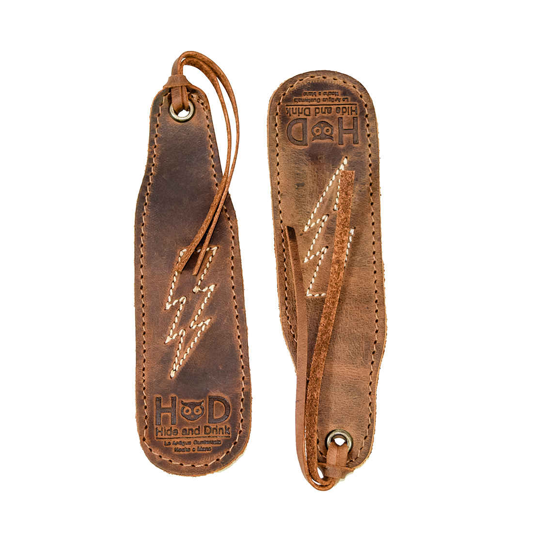 Hide & Drink Bookmark Stitched Designs (2 Pack) featuring a Thunder Potter Design in Full Grain Leather, showcasing small batch production with hand cut and hand sewn craftsmanship. This artisan bookmark, fire branded and handmade in La Antigua Guatemala & Oaxaca Mexico, is perfect for bookworms looking for a vintage touch.
