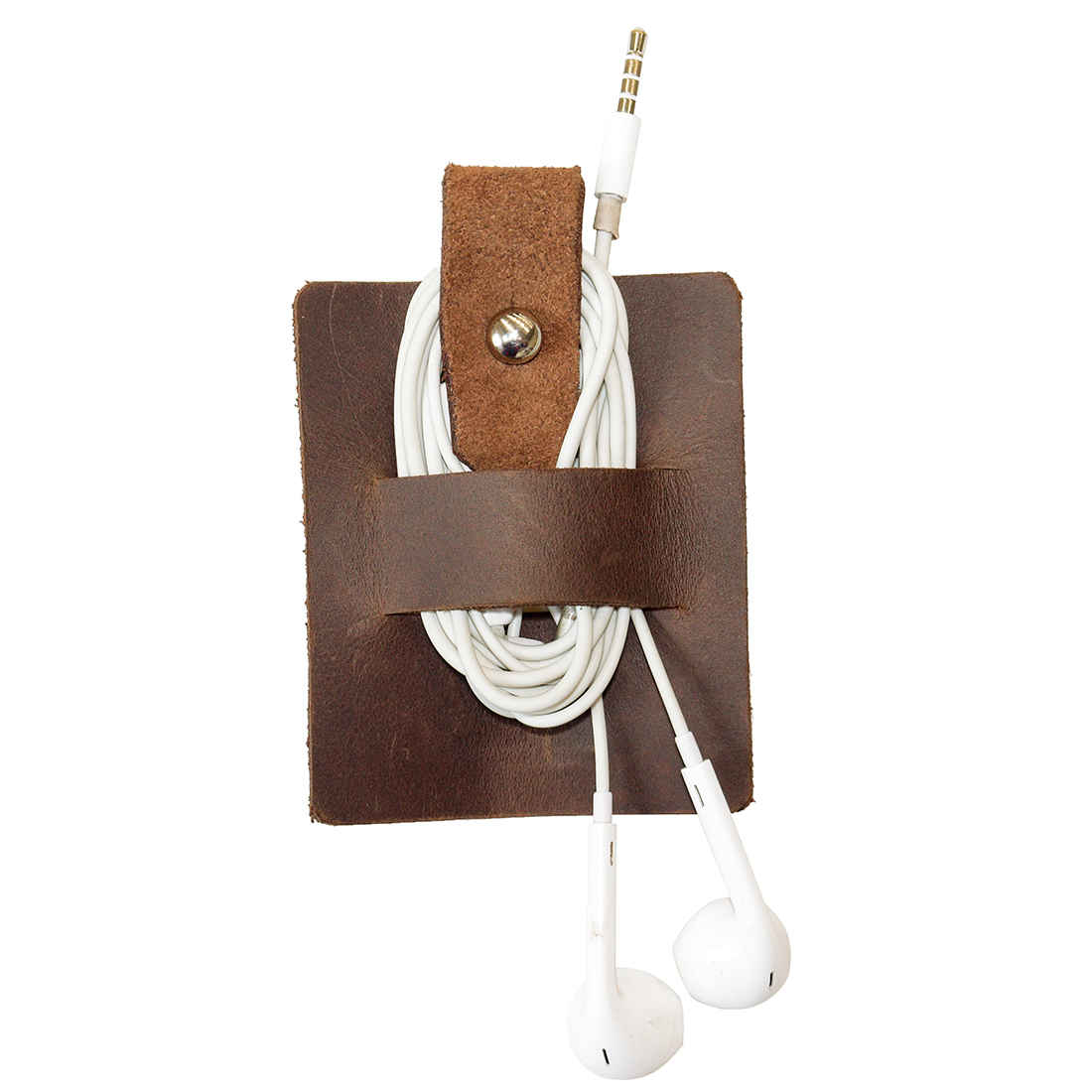 Hide & Drink's Cable Holder made of thick full grain leather, designed to organize wired headphones, chargers, and phone accessories. This artisan product showcases small batch production techniques, hand cut and sewn, and fire branded, handmade in La Antigua Guatemala & Oaxaca Mexico.