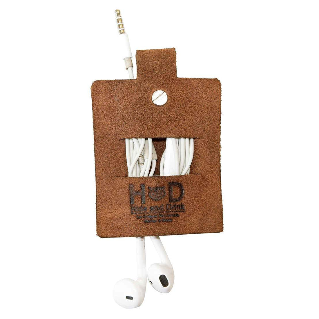 Hide & Drink's Cable Holder, crafted from thick full grain leather, ideal for organizing wired headphones and phone chargers. A perfect blend of functionality and style, this cable organizer is hand cut, hand sewn, and fire branded, showcasing artisan craftsmanship from La Antigua Guatemala & Oaxaca Mexico.