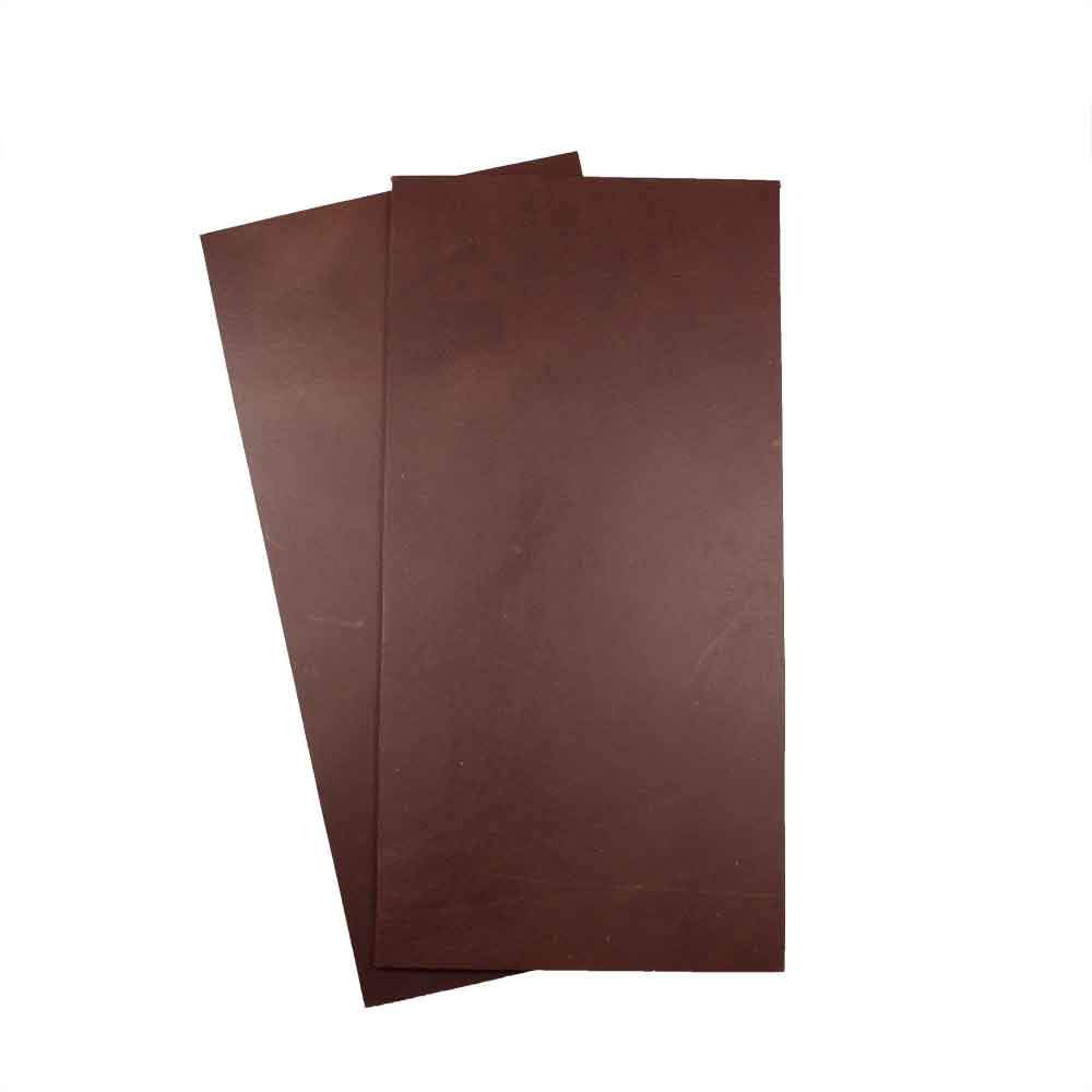 Thick Leather Rectangular Scraps 6 x 12 in. (2 Pack) by Hide & Drink. Two-piece set of dark chocolate brown leather rectangles, perfect for crafting and tooling. Thick Leather Rectangles (6 x 12 in.) 2 Piece Set for Crafts/Tooling/Hobby Workshop, Heavy Weight (3-3.5mm), Full Grain Leather, StockyardX, Small Batch Production, Hand Cut, Hand Sewn, Fire Branded, Artisan, Handmade in La Antigua Guatemala & Oaxaca Mexico.