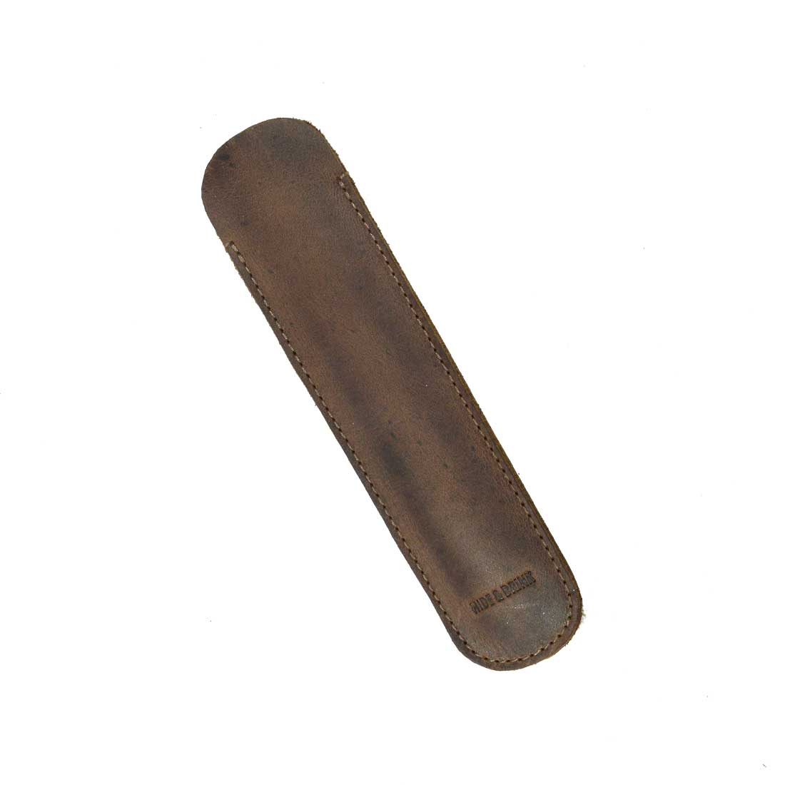 The Vintage Pen Sleeve by Hide & Drink shows off its smooth texture and elegant design, ideal for bookworm accessories. With small batch production and hand-sewn details, it's a true artisan piece crafted with care in La Antigua Guatemala & Oaxaca Mexico.