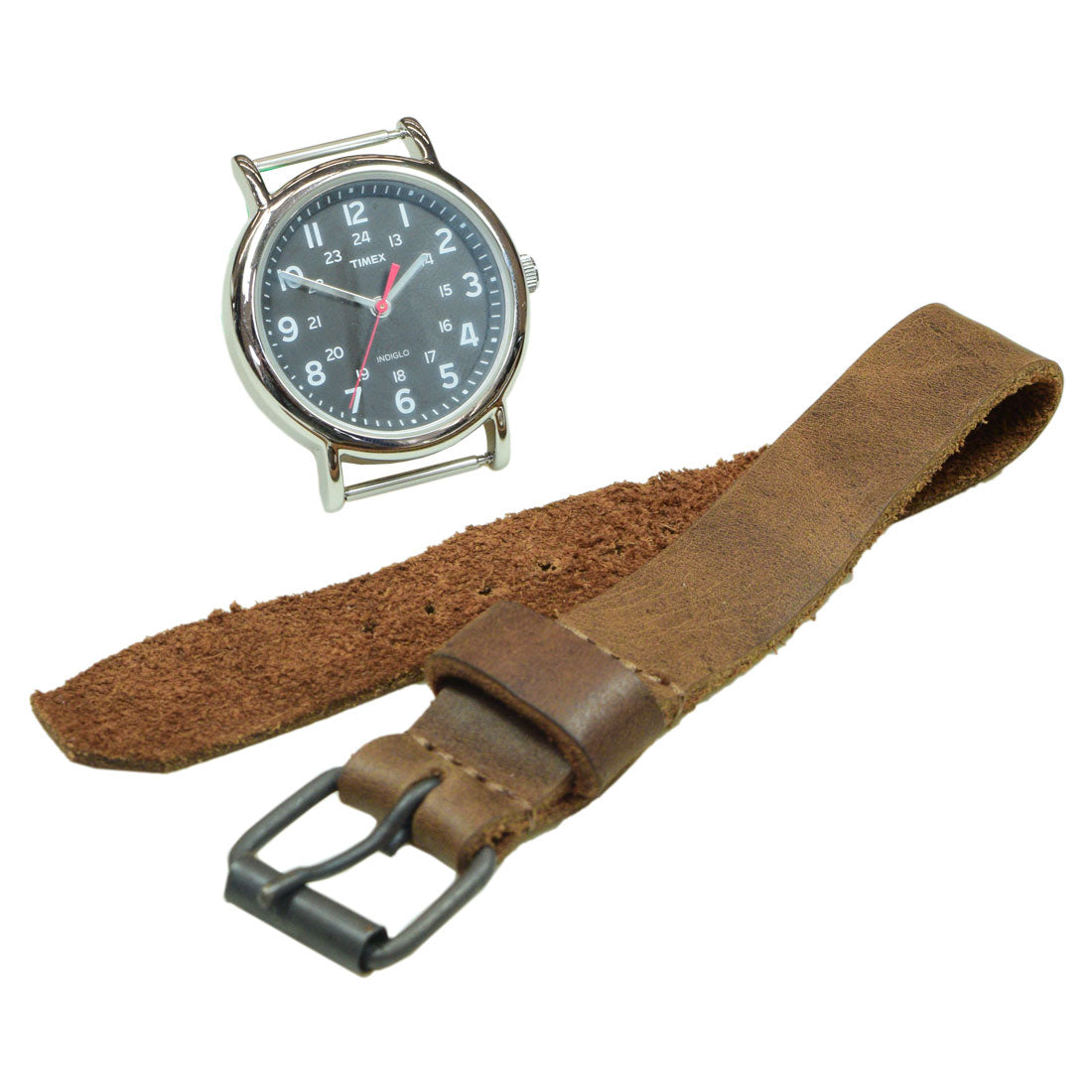 A stylish Watch Strap (20mm) by Hide & Drink featuring a rustic leather design, ideal as a replacement strap for wristwatches. This leather rustic wristwatch strap replacement (20mm buckle, 18mm strap) is handcrafted from full grain leather. Perfect for enhancing your timepiece, this accessory reflects artisan craftsmanship with small batch production, hand cut, hand sewn, and fire branded details. Handmade in La Antigua Guatemala & Oaxaca Mexico.