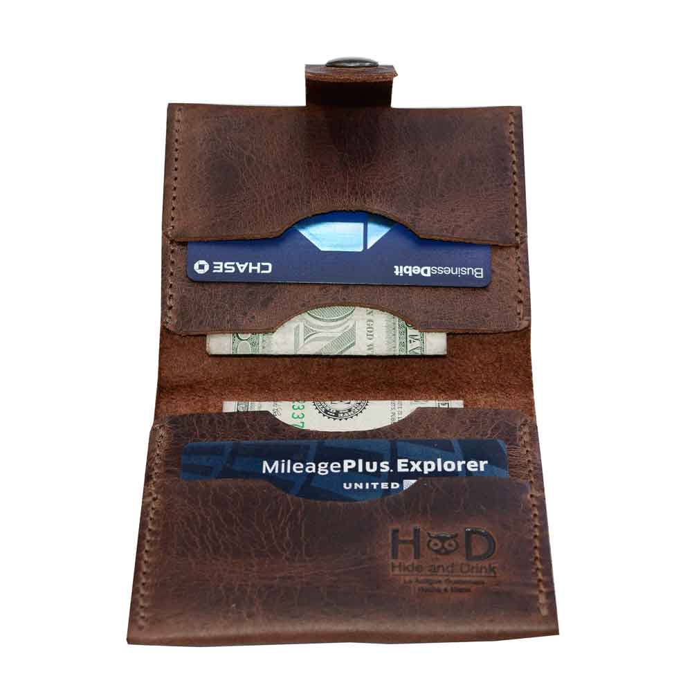 Hide & Drink's Squared Wallet featuring a sleek design, showing card slots and cash compartment, made from Full Grain Leather. This Bifold Simple Wallet is handcrafted in La Antigua Guatemala, promising quality with Small Batch Production and Artisan techniques.