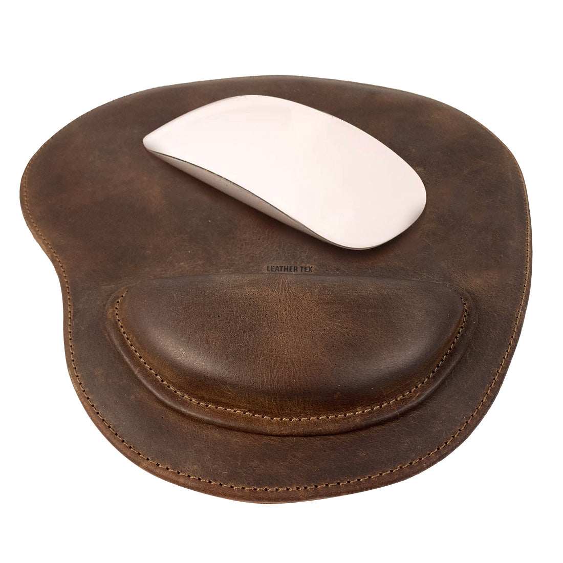A Rustic Oval Shape Mousepad showcasing exquisite full grain leather craftsmanship by LeatherTex, featuring an anti-slip durable stitched design. Perfect accessory for computer, laptop, and Mac users, ideal for office setups. Hand cut and hand sewn in La Antigua Guatemala & Oaxaca Mexico, this artisan mousepad combines style and functionality.