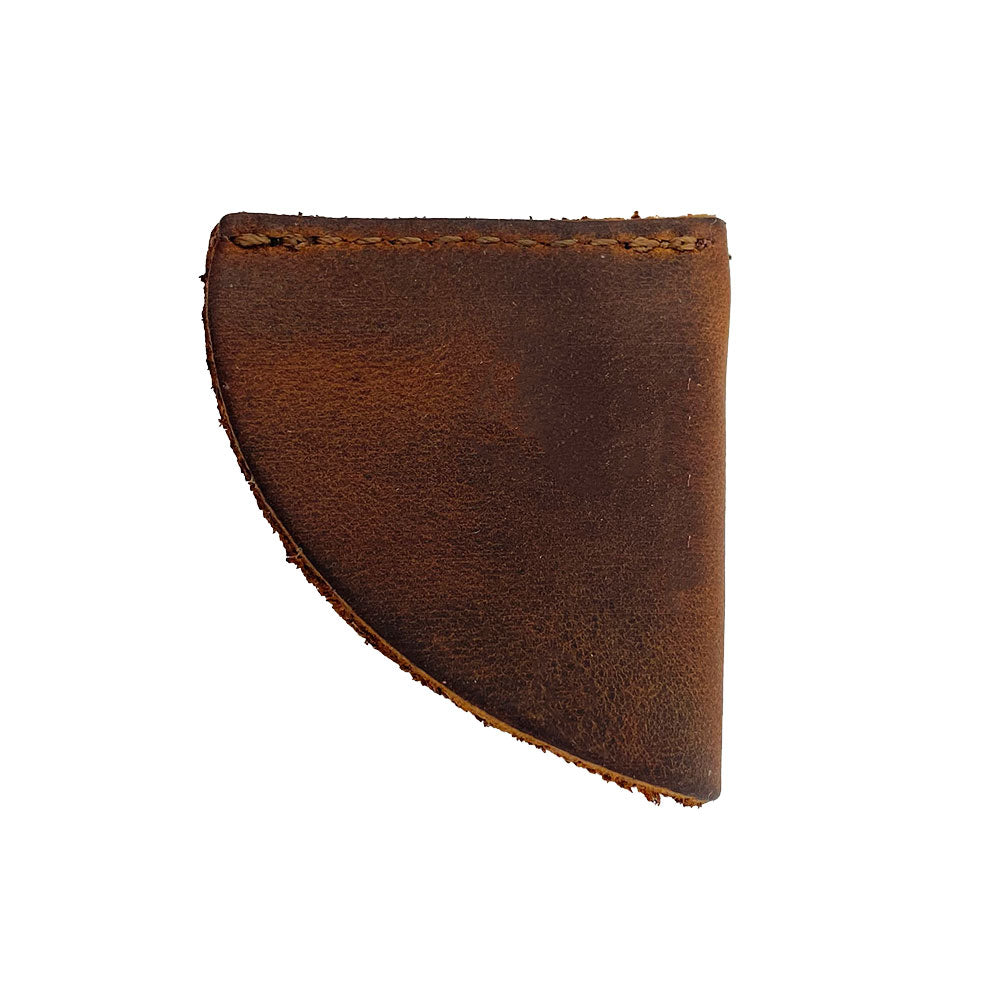 Elegant full grain leather corner bookmark from Hide & Drink, featured in the Corner Bookmark 3-Pack, designed with a simple, clean look. Ideal for book lovers, this bookmark is part of an artisan collection, hand cut, hand sewn, and fire branded, emphasizing quality and small batch production from La Antigua Guatemala & Oaxaca Mexico.