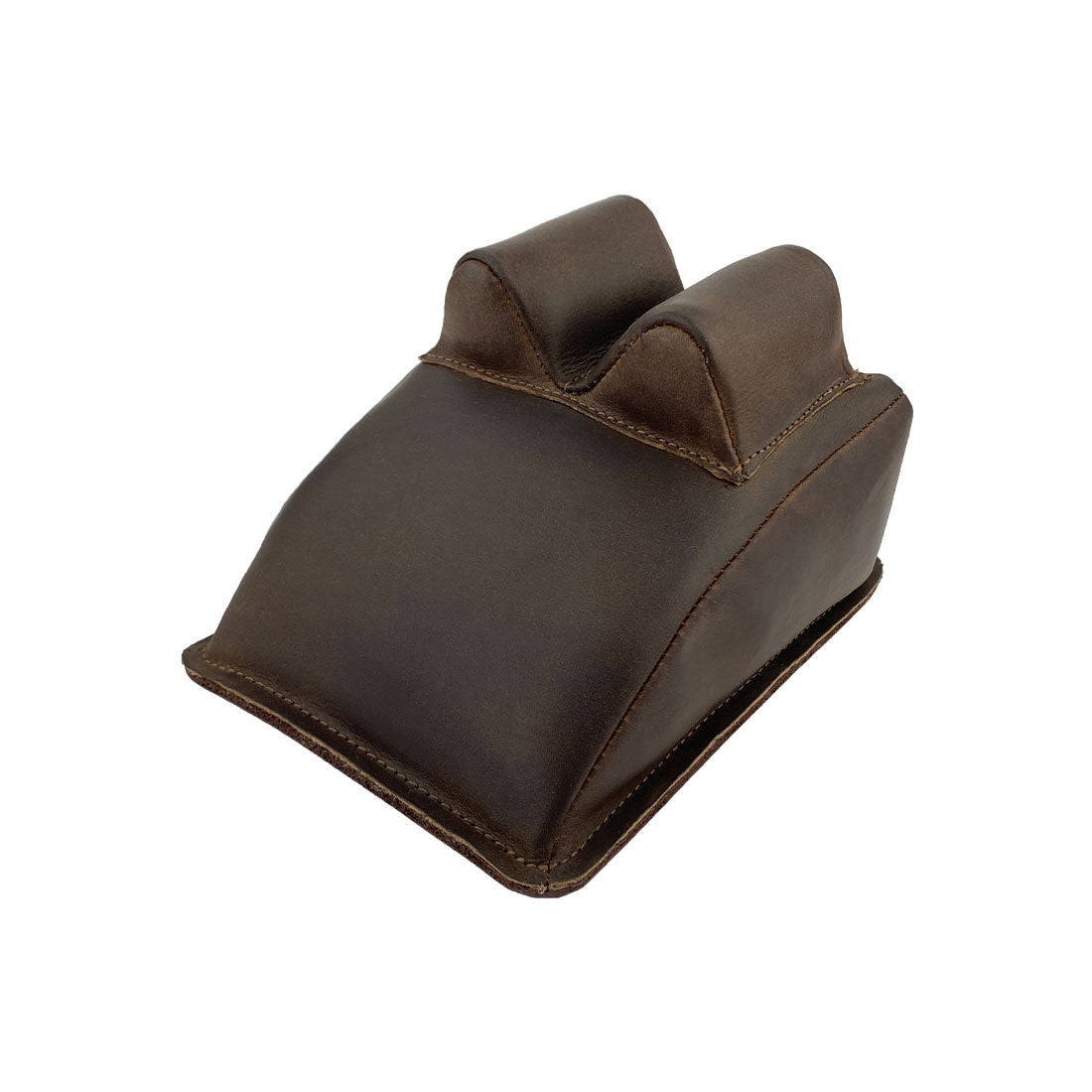 Hide & Drink Guitar Neck Rest designed for string changing, repair, and cleaning care of guitars, violins, banjos, and mandolins, made from durable full grain leather with artisan craftsmanship. This small batch production product is hand cut, hand sewn, and fire branded, showcasing exceptional quality from La Antigua Guatemala and Oaxaca Mexico.