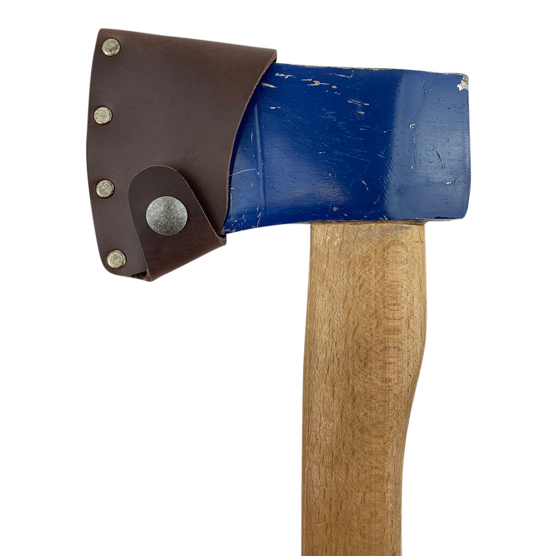 Close up of a blue axe with a secure Hatchet Blade Cover by Valhalla Gear, demonstrating quality craftsmanship and safety for woodworking - Protector Case Cover, Small Axe Blade Safety Sleeve, Camping Accessory, Lumberjack Outdoor Essentials, StockyardX, Small Batch Production, Hand Cut, Hand Sewn, Fire Branded, Artisan, Handmade in La Antigua Guatemala & Oaxaca Mexico.