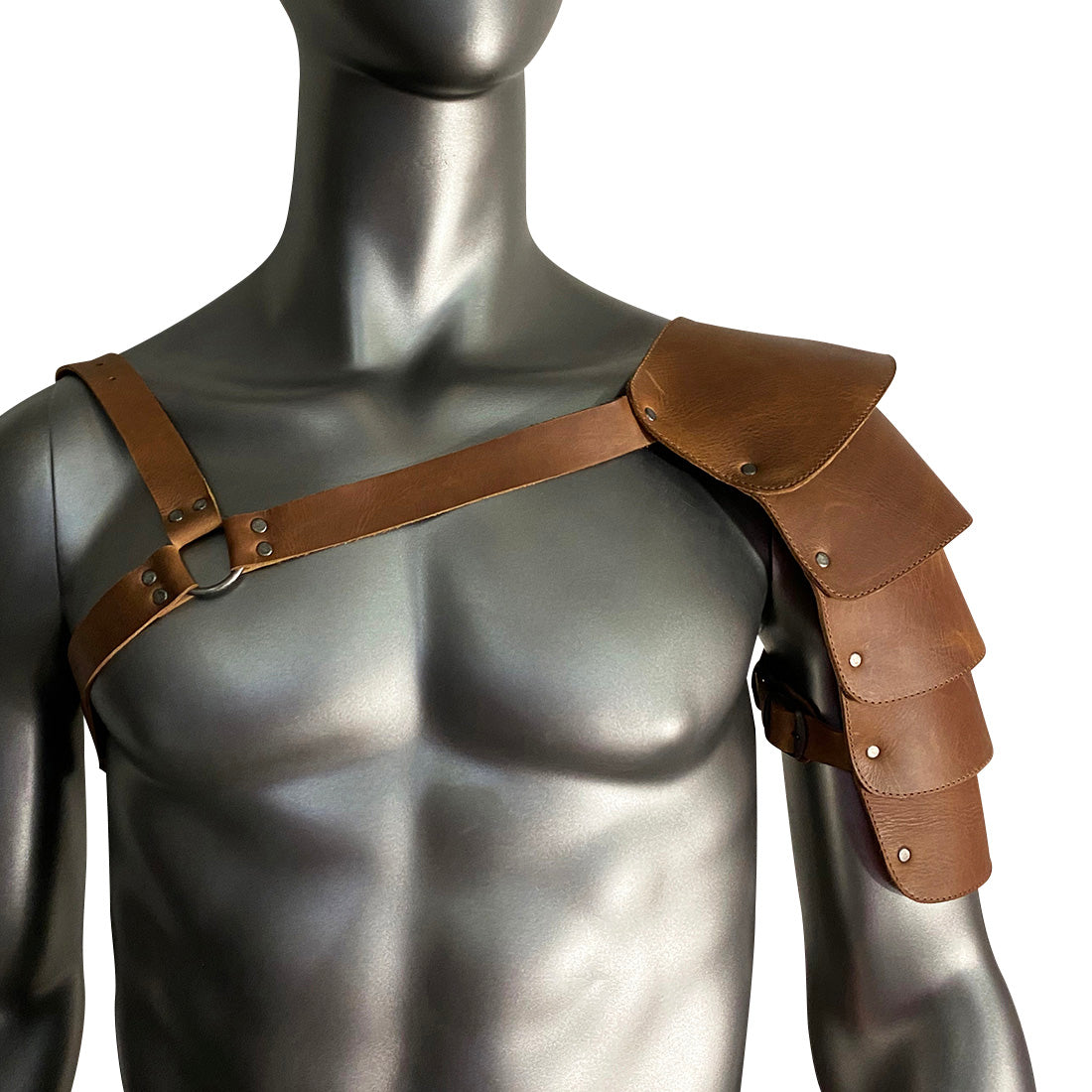 Highlighting the chic design of the Hide & Play Single Shoulder Cover, this image presents a versatile costume arm shield made from full grain leather. With adjustable straps for comfort, it's ideal for Renaissance festivals and cosplay events. Handmade in La Antigua Guatemala, showcasing small batch artisan craftsmanship.