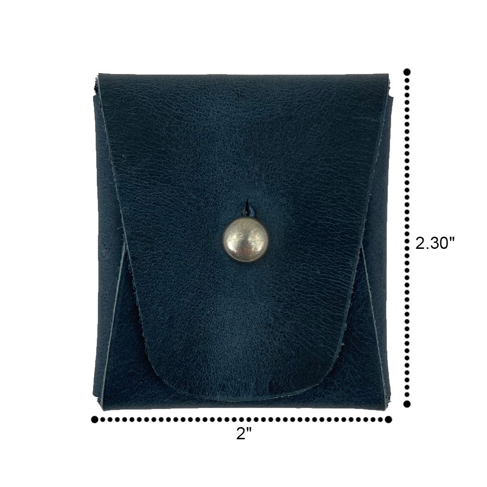 Dimensions of a tan Minimalist Square Coin Pouch by Hide & Drink displayed on a measuring tape. Showcasing excellent craftsmanship, this full grain leather pouch is perfect for various small items and adds a touch of elegance to any collection. Minimalist Coin Pouch, SD Card Holder, Wallet and Cash Organizer, Full Grain Leather, StockyardX, Small Batch Production, Hand Cut, Hand Sewn, Fire Branded, Artisan, Handmade in La Antigua Guatemala & Oaxaca Mexico.