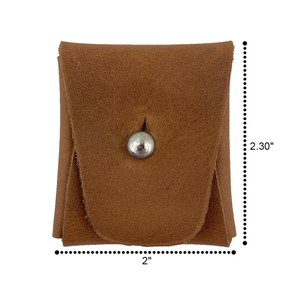 The light brown Minimalist Square Coin Pouch by Hide & Drink filled with assorted coins, demonstrating its practicality. This artisan-crafted leather pouch is a fantastic blend of simplicity and function, ideal for everyday use. Minimalist Coin Pouch, SD Card Holder, Wallet and Cash Organizer, Full Grain Leather, StockyardX, Small Batch Production, Hand Cut, Hand Sewn, Fire Branded, Artisan, Handmade in La Antigua Guatemala & Oaxaca Mexico.